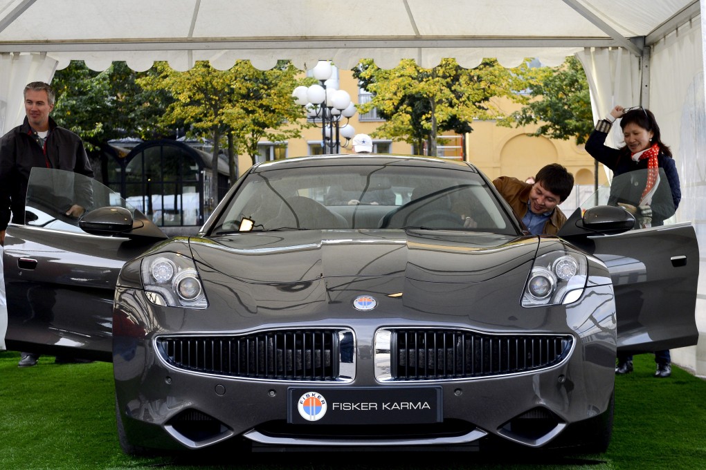 The Fisker Karma, a plug-in hybrid luxury sports sedan produced by Fisker Automotive and manufactured at Valmet Automotive in Finland, is displayed during the Stockholm Car Festival in 2012: Photo: AFP