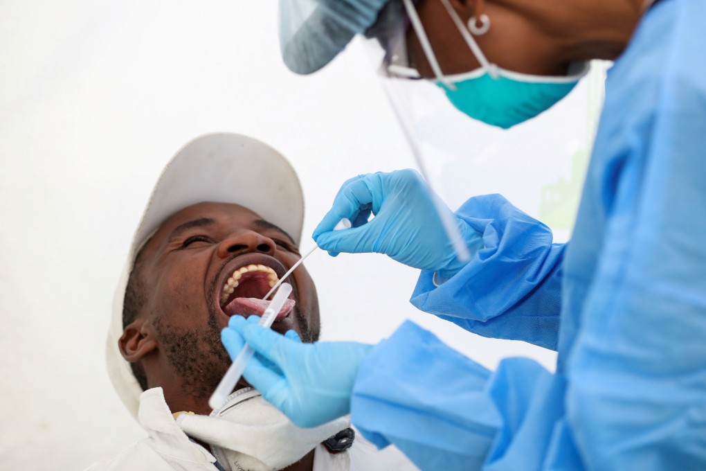 A medical worker takes a swab sample as part of a Covid-19 test in South Africa, which has been hard hit by the coronavirus. Photo: Reuters