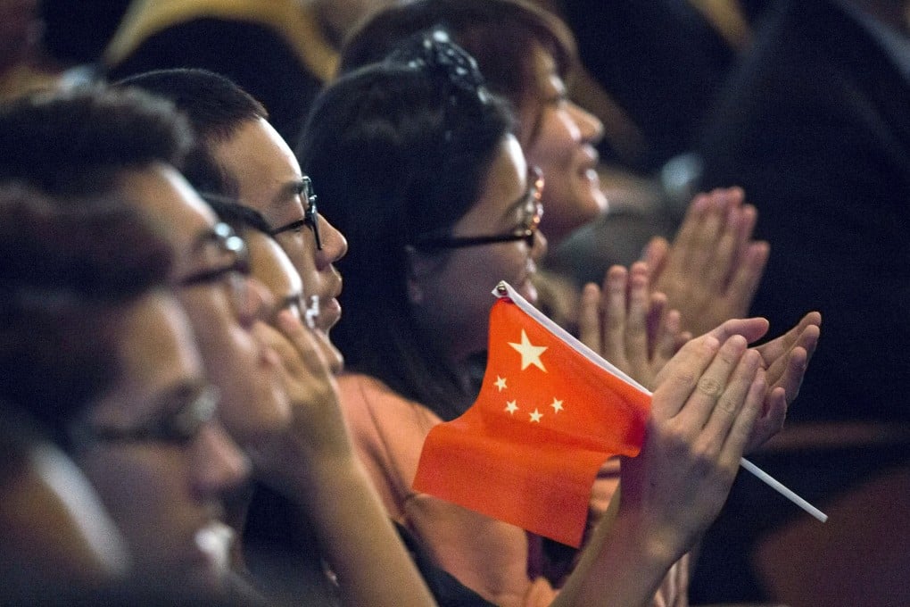 Students clap as Chinese President Xi Jinping delivers a speech during a visit to Lincoln High School in Tacoma, Washington, in September 2015. Photo: Reuters