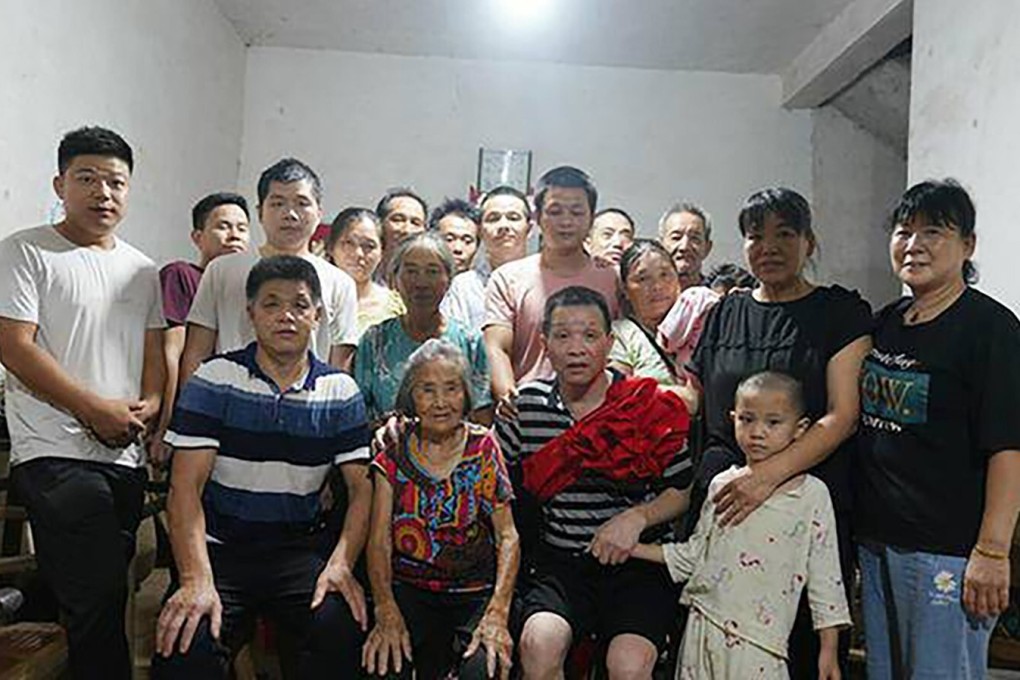 Zhang Yuhuan (front, second from right), gathers with his family after spending almost 27 years in prison before having his conviction overturned on August 4. After multiple appeals, the Supreme People’s Court in Jiangxi province threw out Zhang’s conviction over lack of evidence. Photo: Weibo