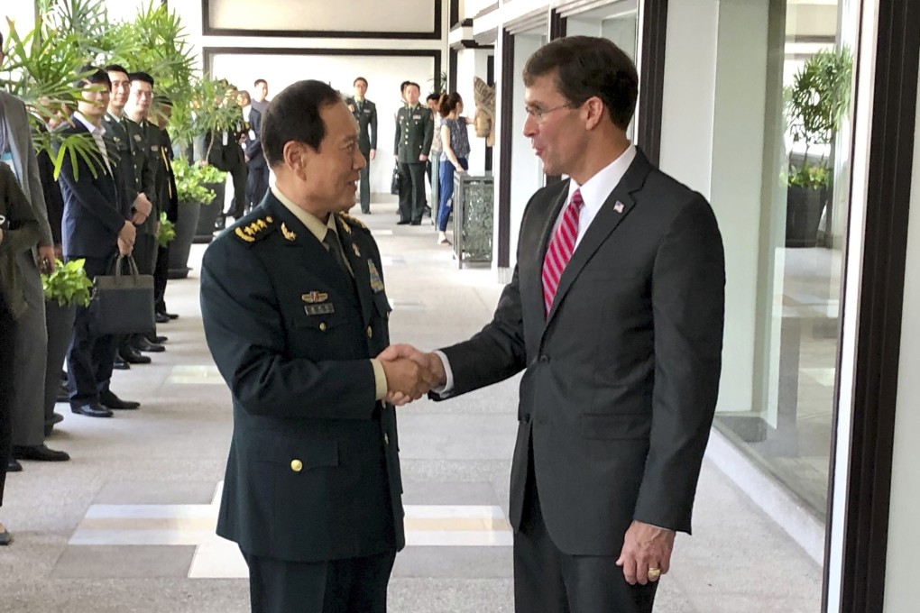 Chinese Defence Minister Wei Fenghe, left, greets US Defence Secretary Mark Esper in Bangkok, Thailand in November 2019. Photo: AP