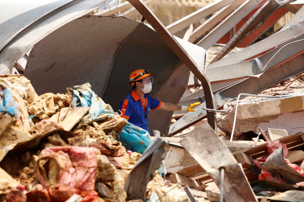 A member of Turkish rescue team works at the site of Tuesday's blast at Beirut's port area on Friday. Photo: Reuters