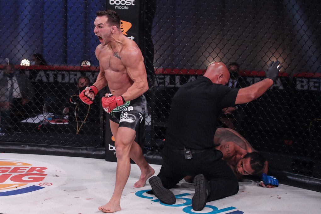 Michael Chandler walks away after knocking out Benson Henderson at Bellator 243. Photos: Bellator MMA