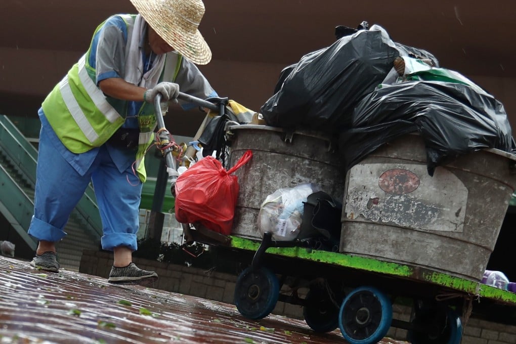 Hong Kong’s cleaners are among overlooked segments in society who are most at risk from Covid-19 infections. Photo: Nora Tam