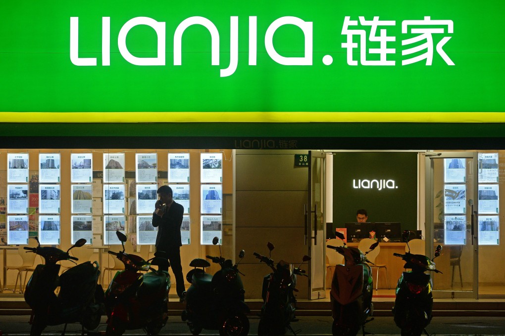 Advertisements on the windows of a Lianjia branch, China's biggest real estate brokerage agency, in Shanghai on March 5, 2016. Photo: Lai Xinlin