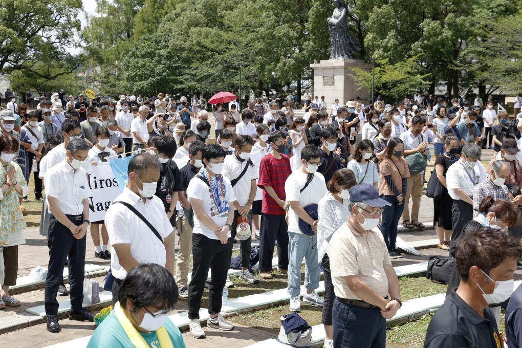 People offer silent prayers for the victims of the 1945 atomic bombing on Nagasaki. Photo: Kyodo