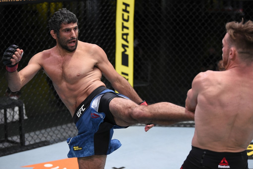 Beneil Dariush kicks Scott Holtzman in their lightweight fight during the UFC Fight Night event at UFC APEX in Las Vegas. Photos: Chris Unger/Zuffa LLC