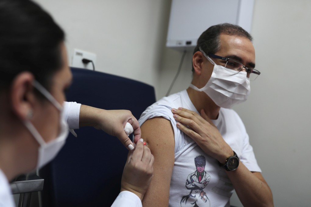 A nurse administers a potential coronavirus vaccine made by China’s SinoVac to a volunteer in Brazil on July 30. Photo: Reuters