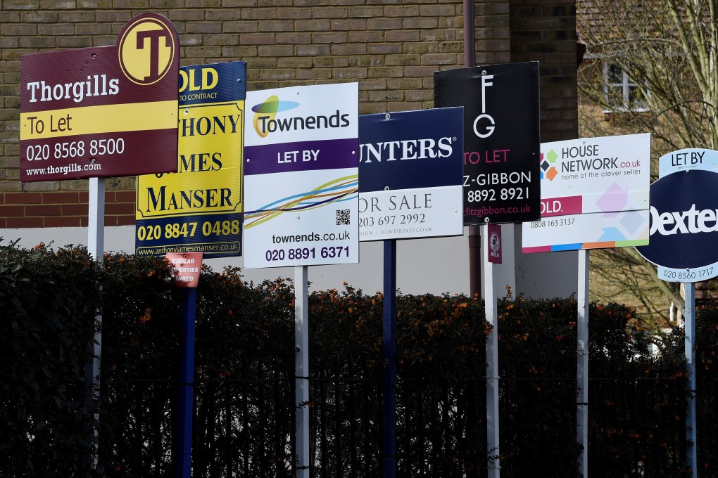 Property agents’ sales and to let signs are seen in London. London is epcted to see a revival in overseas buying interest after the pandemic ends. Photo: Reuters