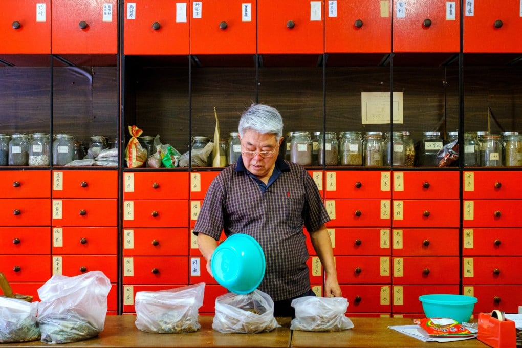 Herbalist Dr Zhang prepares a concoction of Chinese herbs at Hoaping Clinic in Northbridge, Perth, Western Australia. Northbridge is like stepping through a portal into China itself. Photo: Lynn Gail