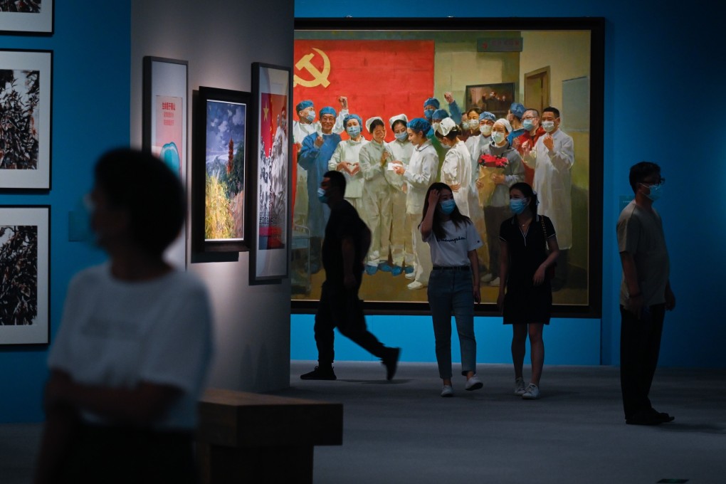 Visitors at the Unity Of Strength Exhibition in Beijing. Photo: AFP