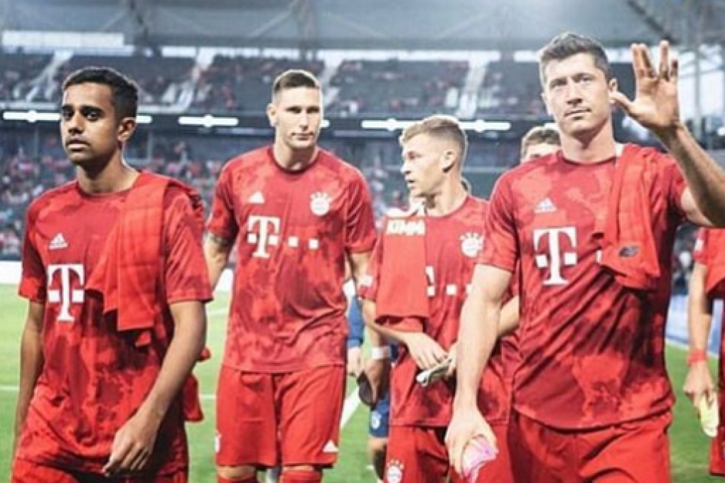 Sarpreet Singh walks off the pitch with Bayern Munich teammates after a 6-1 win over Werder Bremen in 2019. Photo: Instagram/Sarpreet Singh
