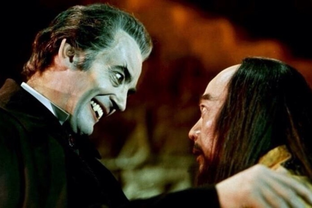 John Forbes-Robertson, as Count Dracula, and Chan Shen, as a Chinese priest who invites the Count to China, in a still from The Legend of the 7 Golden Vampires (1974).