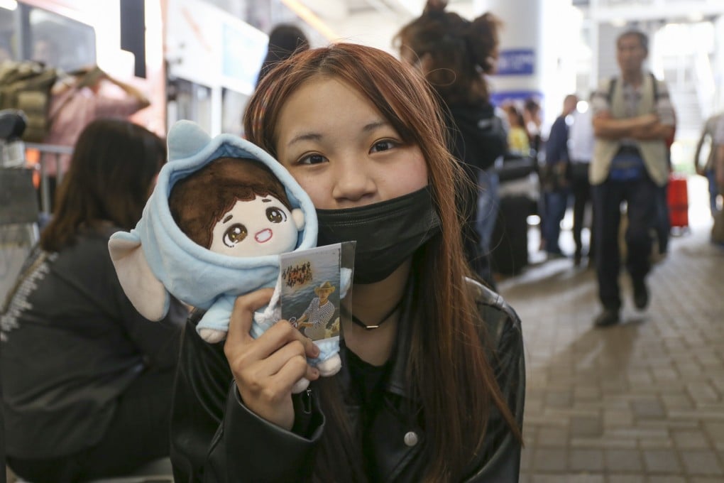 Some K-pop fan-girls fear ridicule from friends and family for having ‘lowbrow tastes’. This 14-year-old fan spent the night at Hong Kong International Airport to catch a glimpse of BTS. Photo: Rachel Cheung