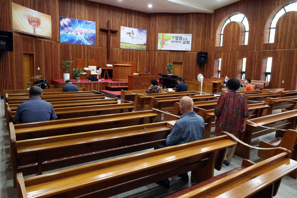 Worshippers attend a Sunday service while maintaining social distancing at a Protestant church in Gwangju, South Korea, last month. Photo: EPA