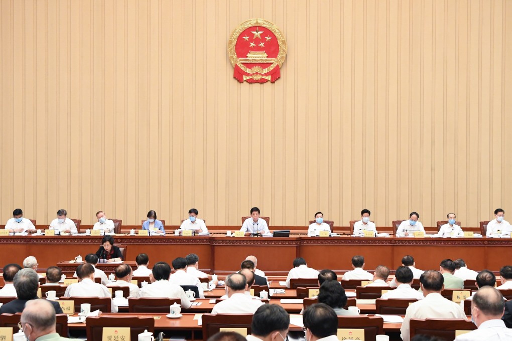 Li Zhanshu, chairman of the National People’s Congress Standing Committee, presides over a meeting of the body in June. Photo: Xinhua/Shen Hong