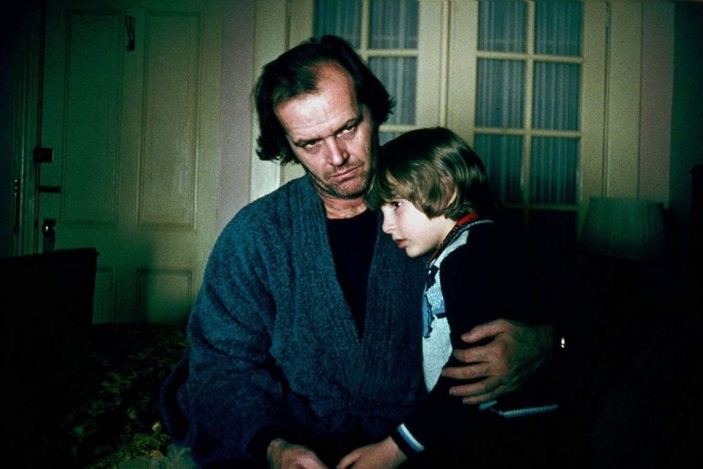 Jack Nicholson and Danny Lloyd in a still from The Shining, one of five movies on our list to watch during lockdown about fictional families in horrible situations.