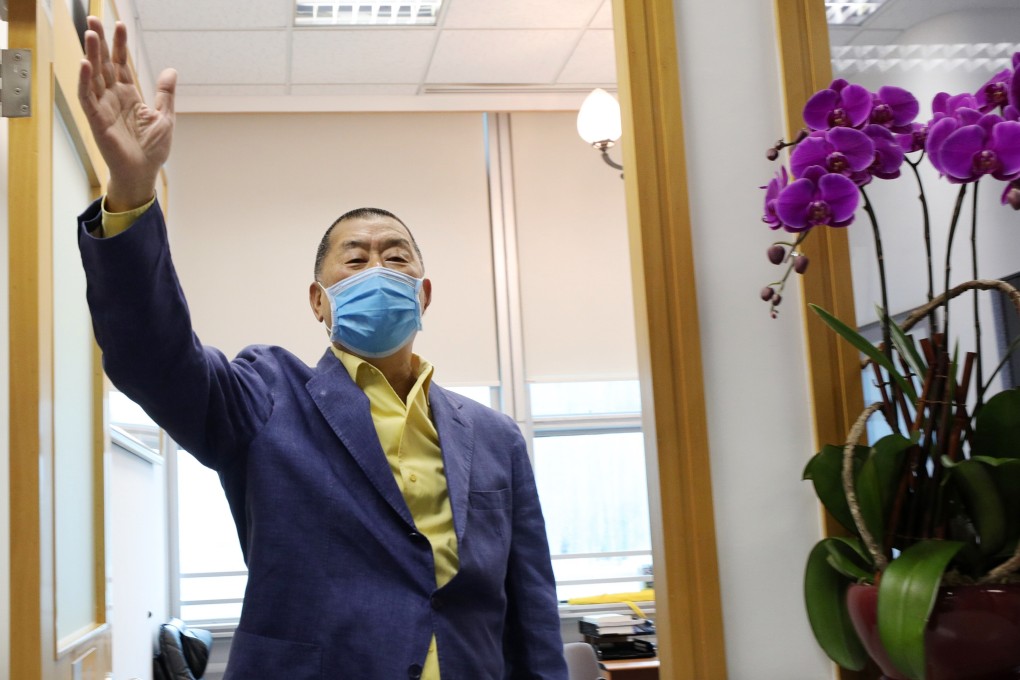 Jimmy Lai returns to the Apple Daily office on Wednesday, after his release on bail. Photo: Handout