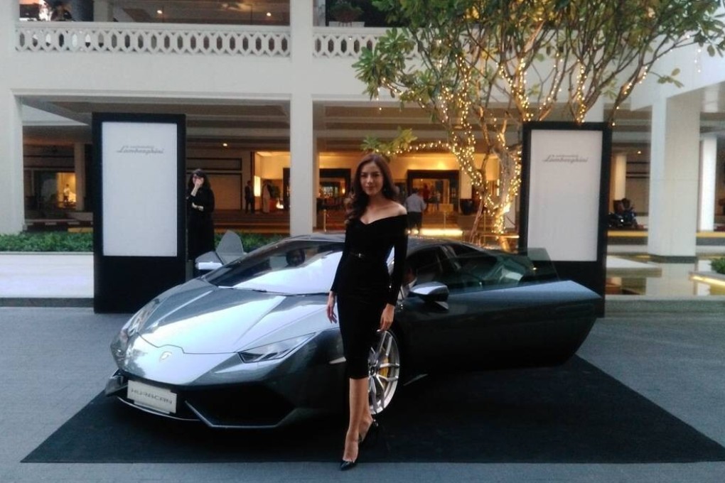 Thai actress and model Nisachon Tuamsoongnuen poses with a Lamborghini in Bangkok. Photo: Instagram / Lamborghini Club Thailand