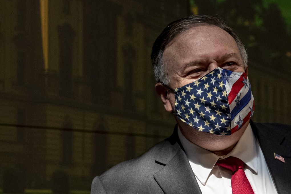US Secretary of State Mike Pompeo adjusts his face mask after a press conference in Prague on Wednesday. Photo: EPA-EFE