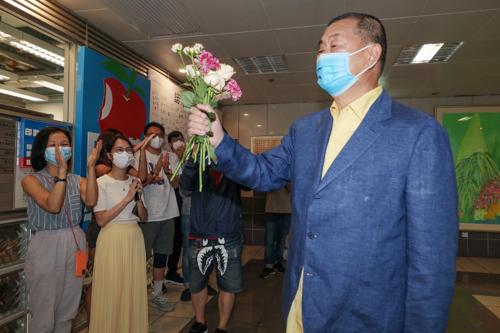 Jimmy Lai returns to his headquarters on Wednesday and receives a hero’s welcome. Photo: Handout