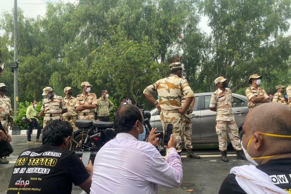 Delhi paramilitary personnel arrive at a protest held by the Delhi Network of Positive People (DNP+) – a group of people and advocates who live with HIV – outside a hepatitis clinic. Photo: Handout