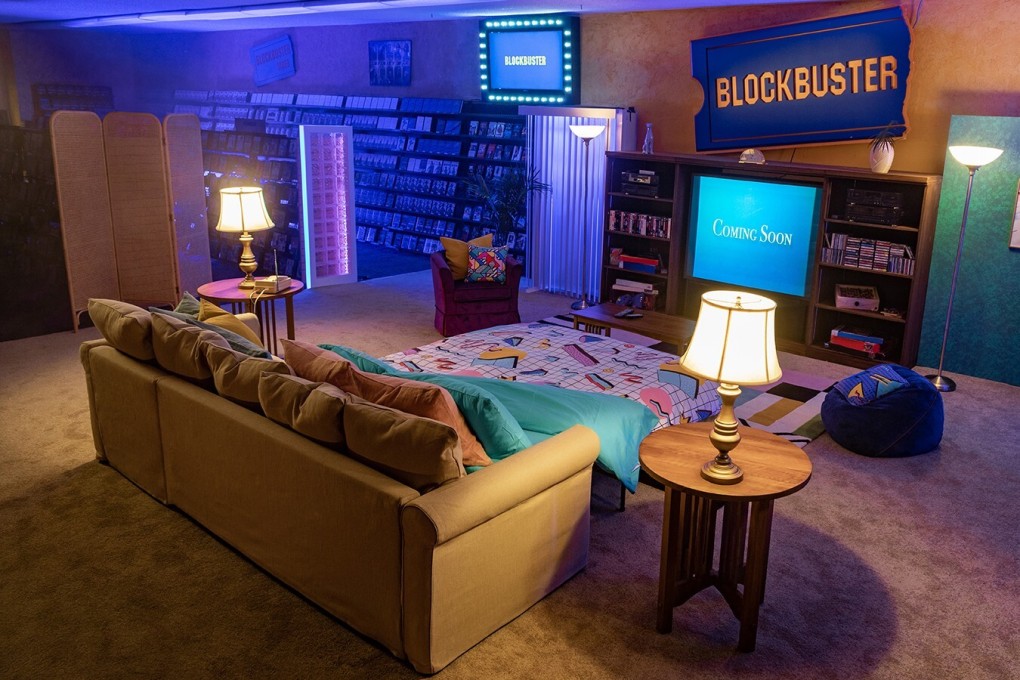 The last Blockbuster store has been listed on Airbnb. Dig out your denim – its makeshift living room is perfectly suited for a nostalgic night in watching a ’90s films. Photo: Airbnb