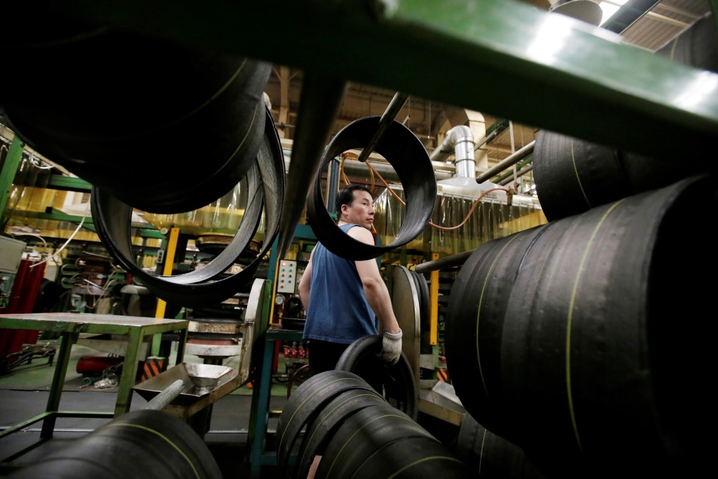 A Tianjin Wanda Tyre Group factory employee in Hebei, China. The company exports to countries such as US and Japan. Moody’s says the impact of reshoring on China will be limited. Photo: Reuters