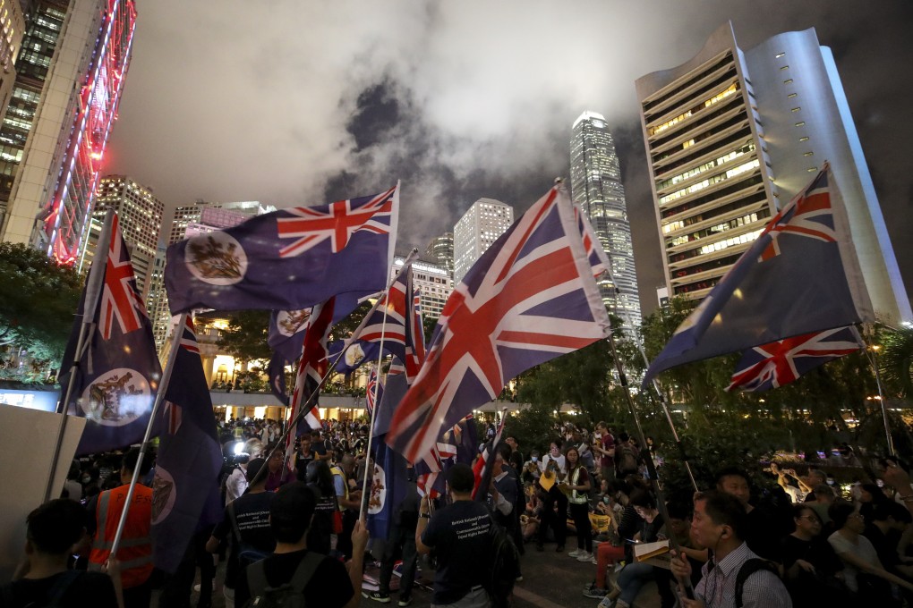 Extradition bill protesters attend a ‘Stand with Hong Kong: Power to the People’ rally, organised by the local academic community at Chater Garden in August of 2019. Photo: Winson Wong