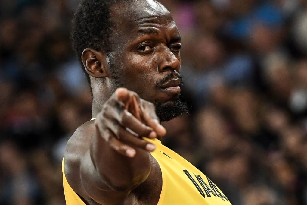 Jamaica's Usain Bolt gestures to the crowd before the start of the final of the men's 4x100m relay athletics event at the 2017 IAAF World Championships at the London Stadium in London, his final ever race. Photo: AFP