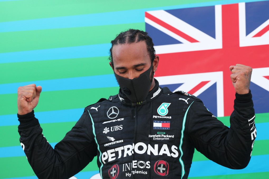 Lewis Hamilton celebrates on the podium at the Spanish Grand Prix. Photo: Reuters