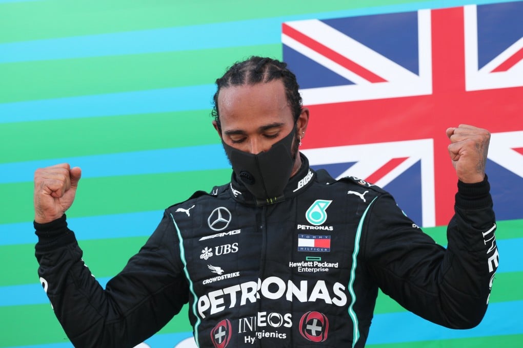 Lewis Hamilton celebrates on the podium at the Spanish Grand Prix. Photo: Reuters