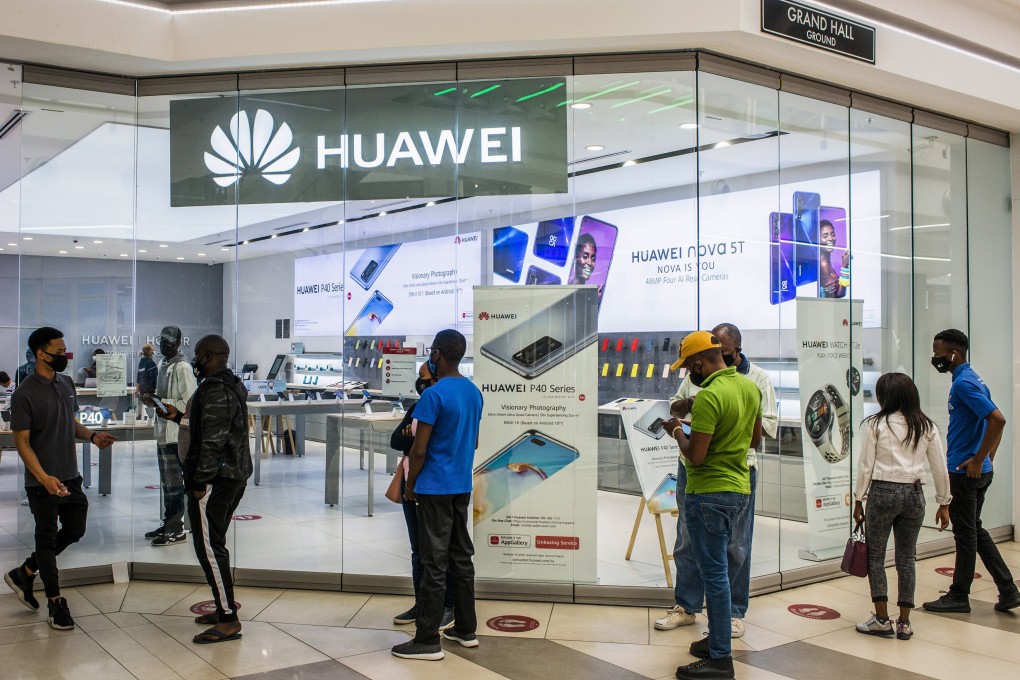 Customers wait outside a Huawei store in Pretoria, South Africa. Photo: Bloomberg