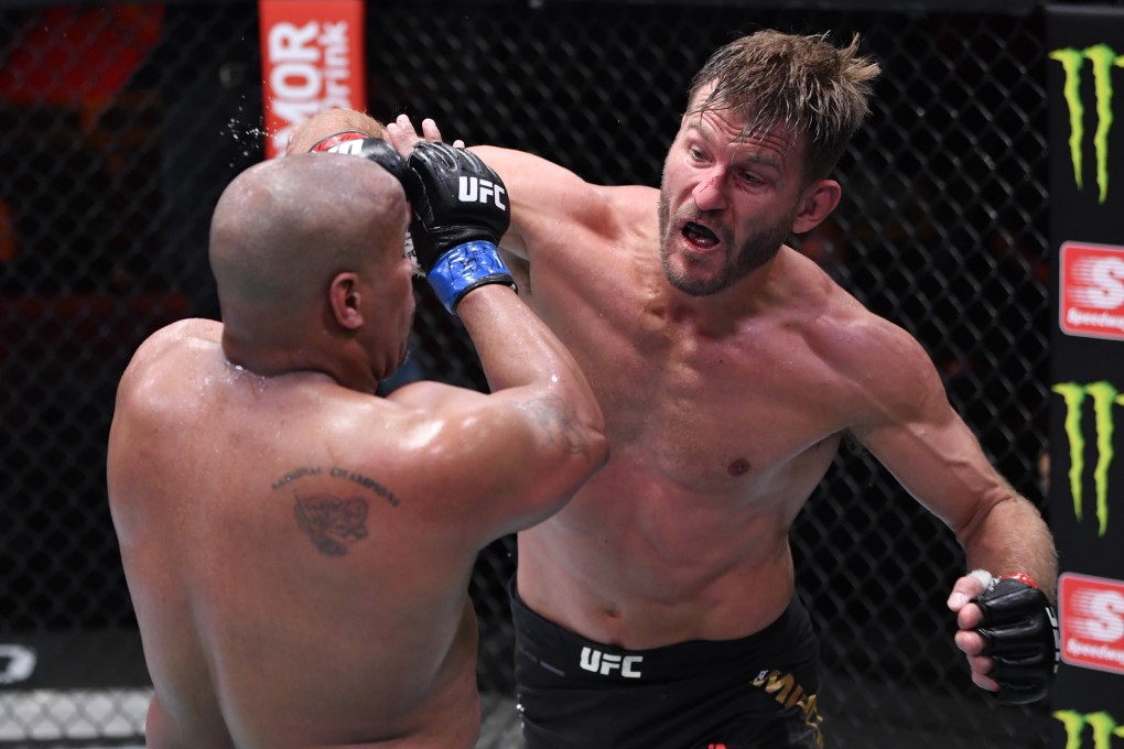 Stipe Miocic punches Daniel Cormier in their UFC heavyweight championship bout during UFC 252. Photo: Jeff Bottari/Zuffa LLC