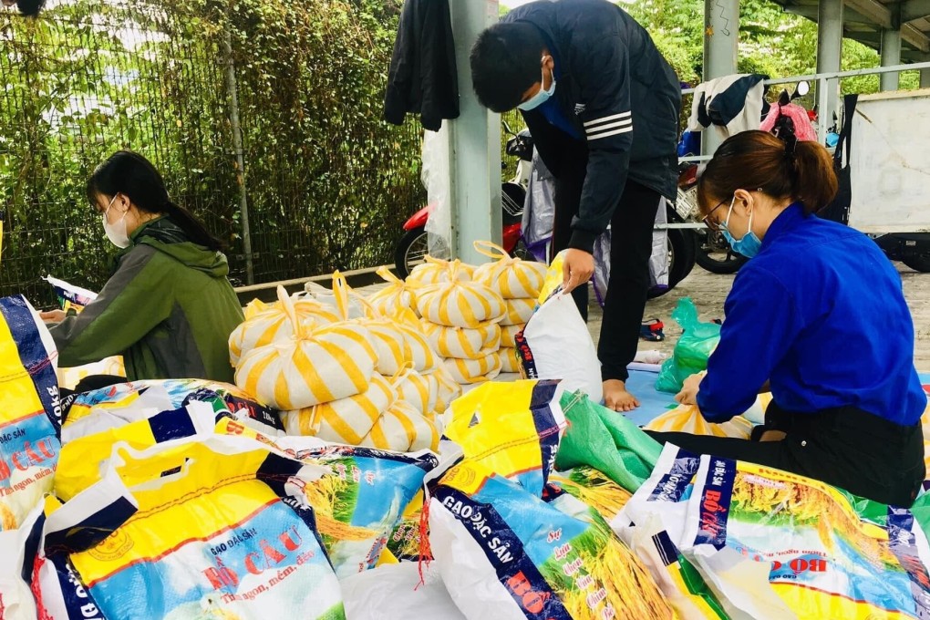 Volunteers from Vietnamese organisation Karma Waters Charitable Association organise food donations for the needy. Photo: Handout