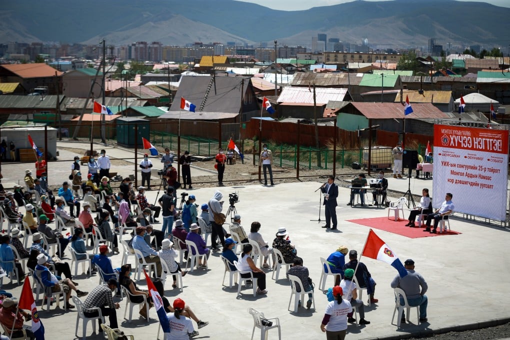 An election candidate speaks at a campaign event for the Mongolian People's Party in Ulan Bator. Mongolia is seen by some as “an oasis of democracy” in the region. Photo: AFP