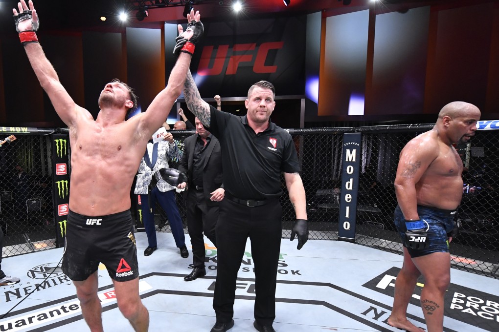 Stipe Miocic celebrates his victory over Daniel Cormier in their UFC heavyweight championship bout at UFC 252. Photo: Jeff Bottari/Zuffa LLC