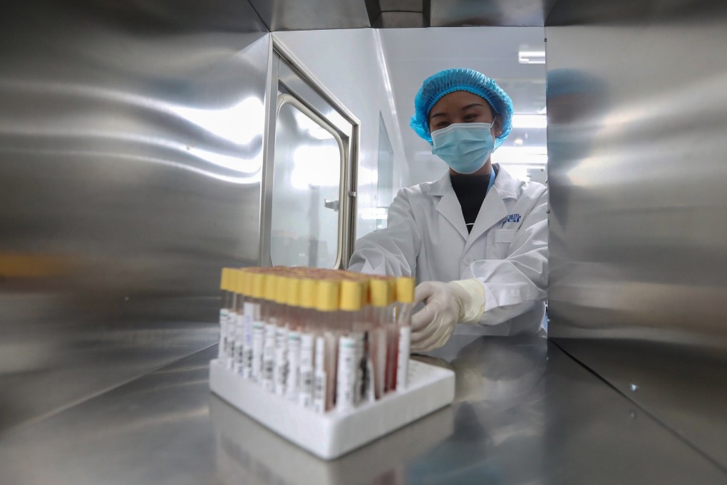 A technician at a BGI testing laboratory. Photo: Reuters