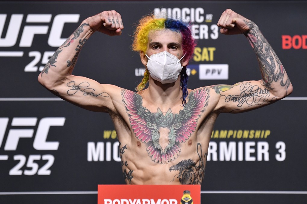 Sean O'Malley poses on the scale during the UFC 252 weigh-in. Photo: Jeff Bottari/Zuffa LLC