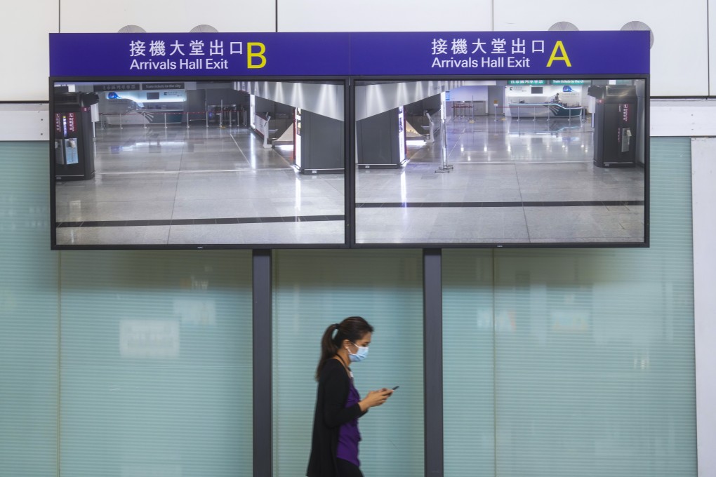 There are few travellers in the arrival hall of Hong Kong International Airport. Photo: Winson Wong