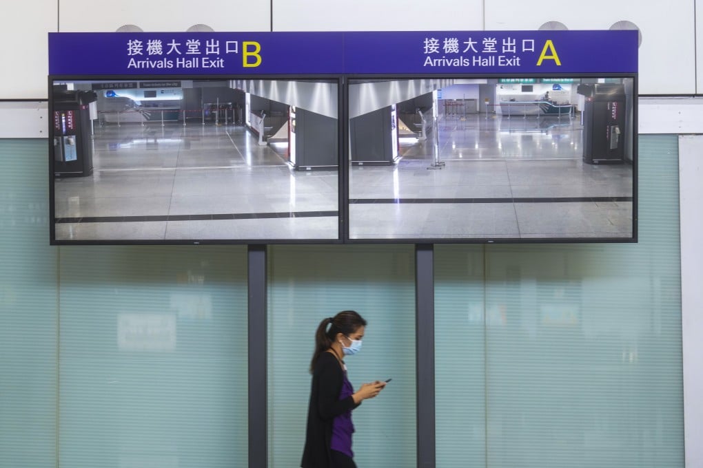 There are few travellers in the arrival hall of Hong Kong International Airport. Photo: Winson Wong