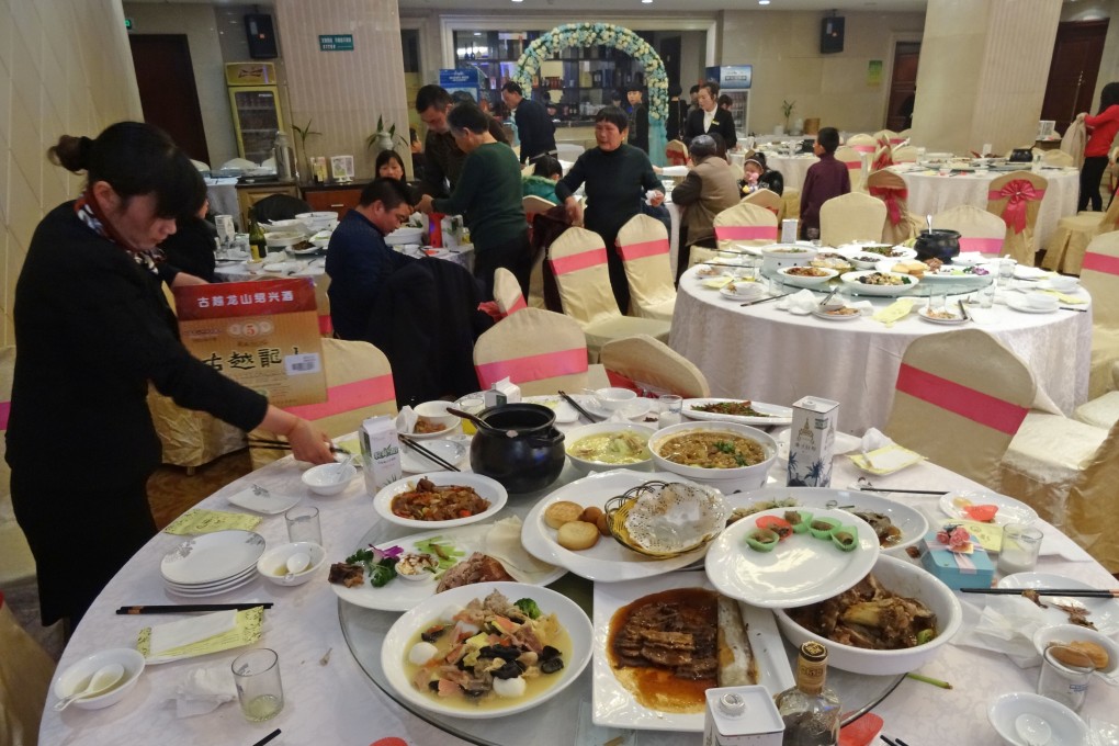 Some cities have recommended groups of restaurant diners order one dish fewer. Photo: Imaginechina