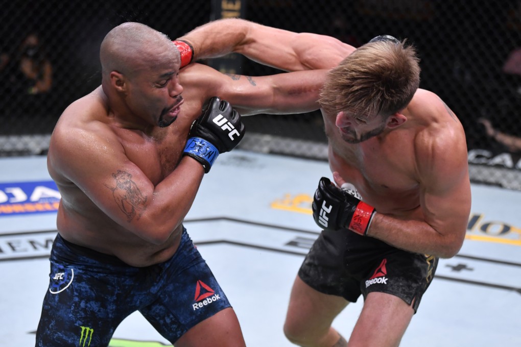 Daniel Cormier and Stipe Miocic trade blows in their UFC heavyweight championship bout at UFC 252. Photo: Jeff Bottari/Zuffa LLC