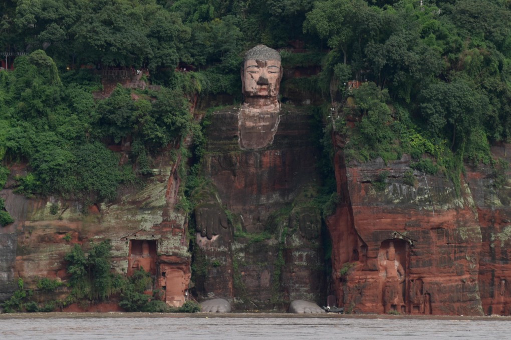 The Leshan Giant Buddha in Sichuan province has come under threat from rising floodwaters. Photo: Xinhua