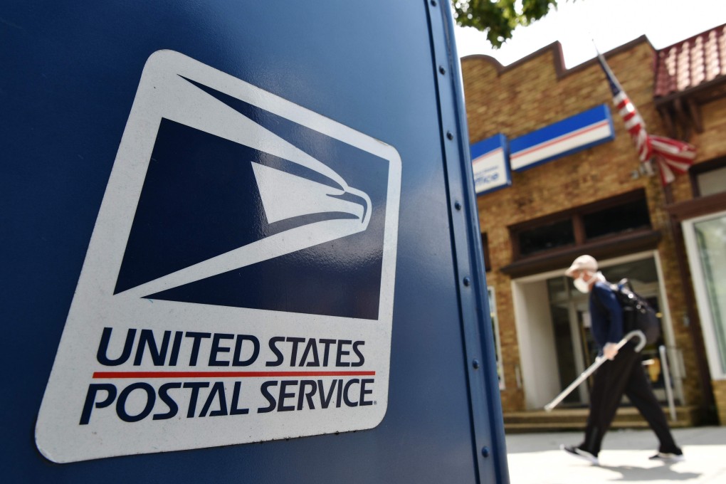 The US Postal Service will hold off of on making changes blamed for slowing down mail delivery until after the November election. Photo: AFP