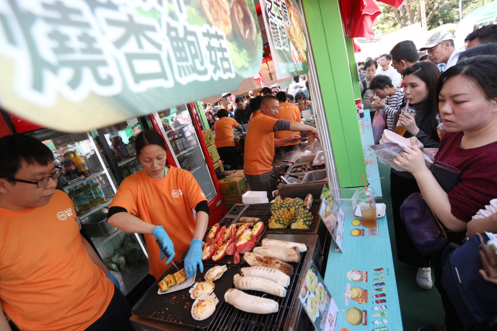 Food stalls draw visitors to the 2019 Hong Kong Brands and Products Expo in Causeway Bay in December 2019. Hong Kong businesses have worked hard to build up their brand image. Photo: Nora Tam