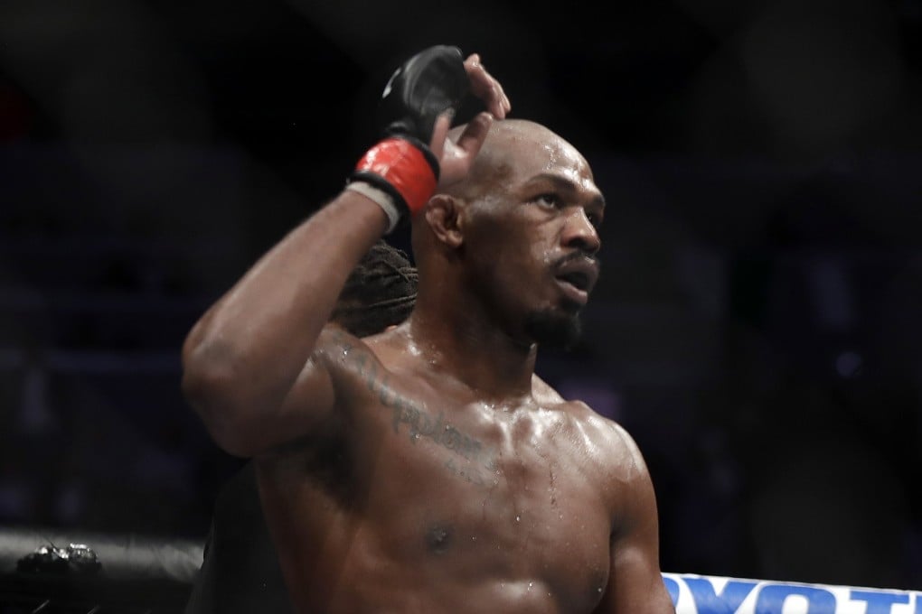 Jon Jones celebrates after defeating Anthony Smith in their light heavyweight title bout during UFC 235. Photo: AFP