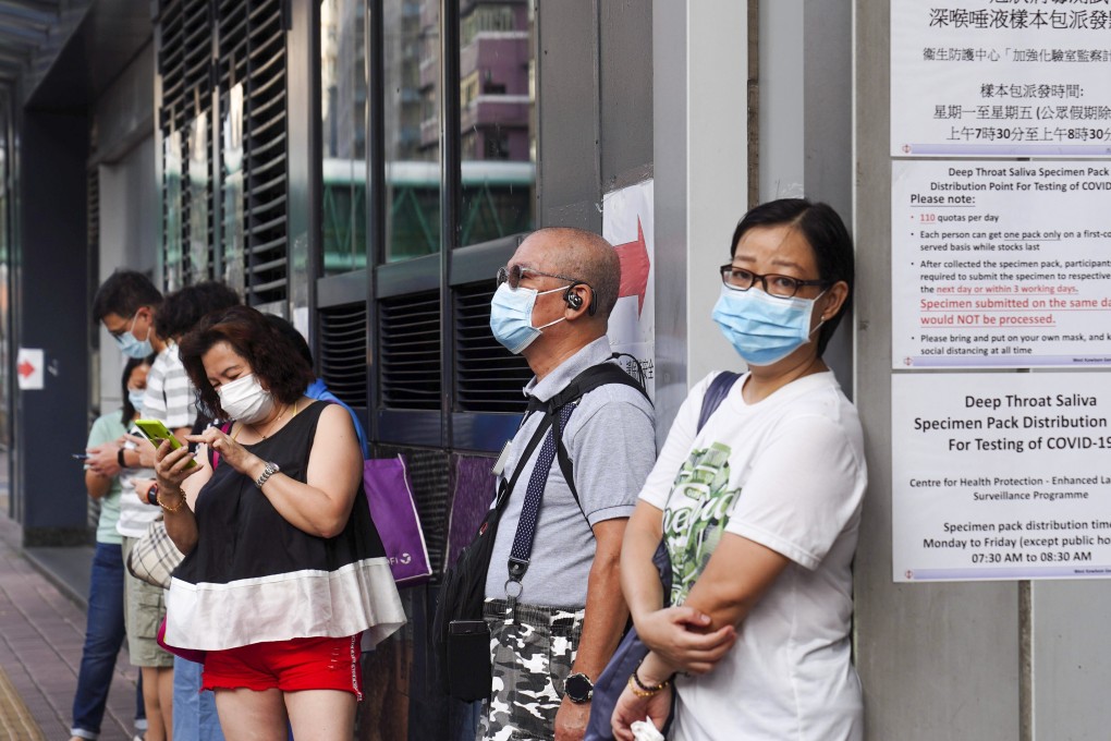 People queue up to collect test kits at the West Kowloon Health Centre in Sham Shui Po. Photo: Sam Tsang