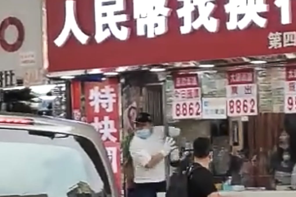 The robbery took place just after 5pm last Saturday when a masked man used a hammer to break into a money exchange shop in Yuen Long. Photo: Facebook