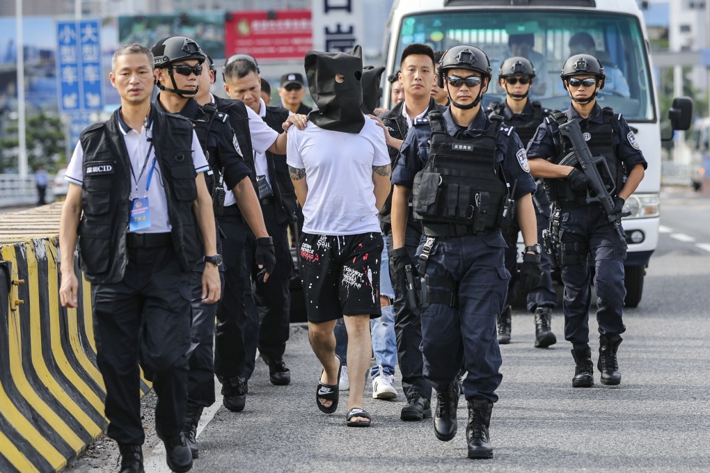 Mainland Chinese police hand over robbery suspects to Hong Kong authorities. The US often made use of its extradition deal with the city, which sent over 69 fugitives at Washington’s request. Photo: Edward Wong